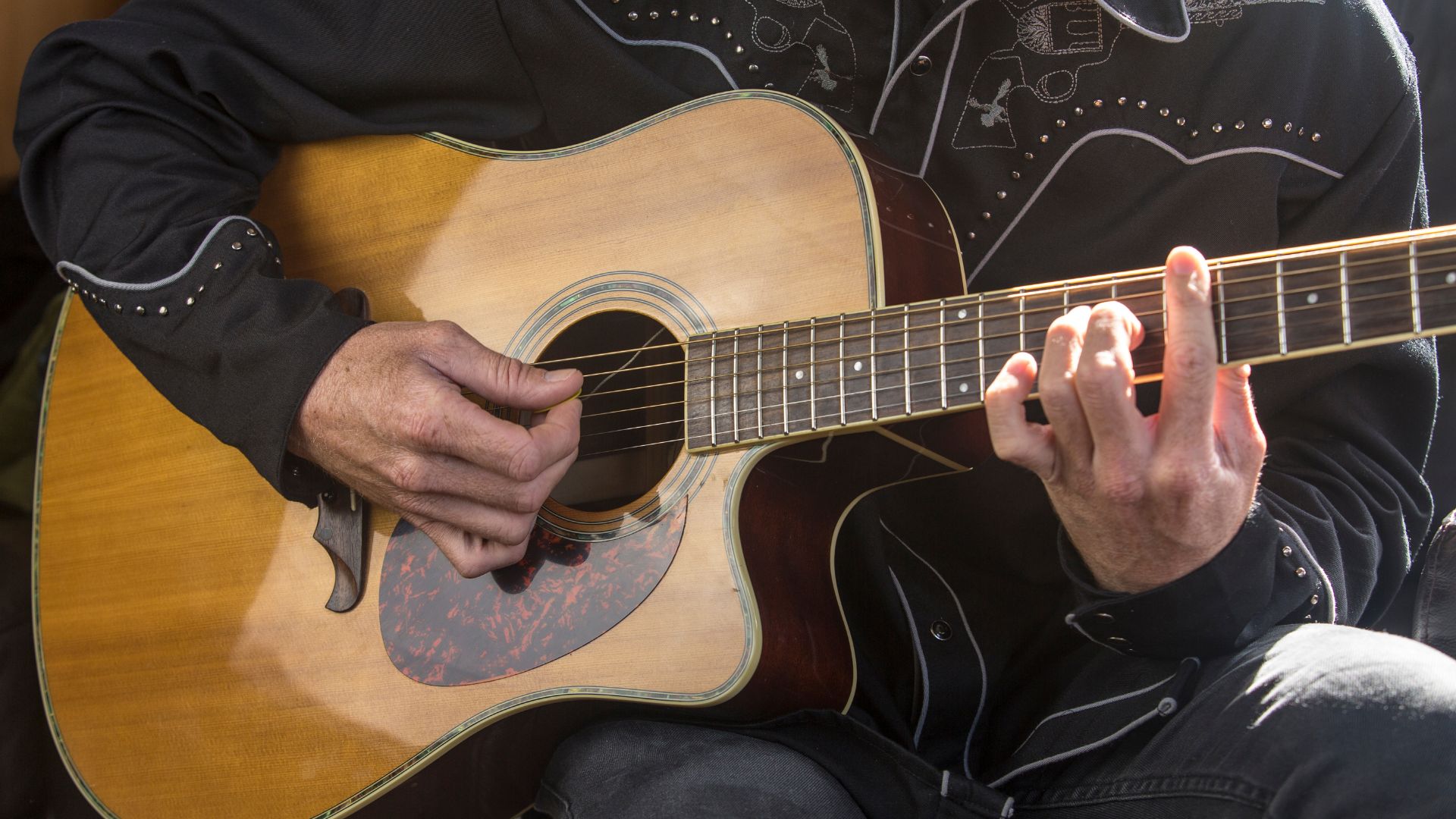 man playing guitar