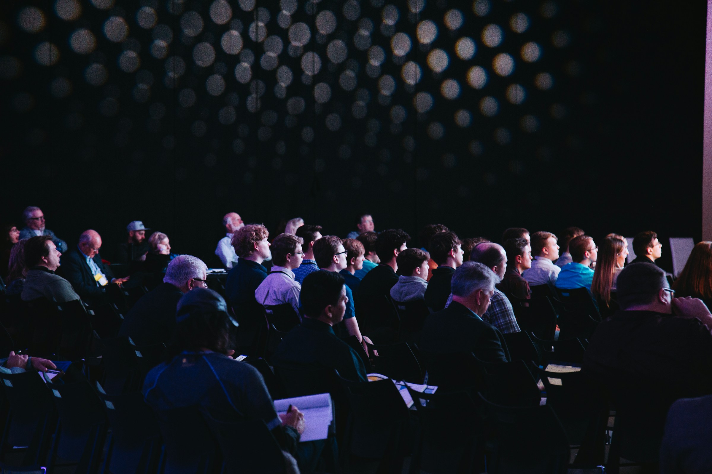 Group of people in an assembly hall